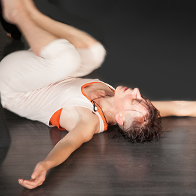 Dancer resting on the floor